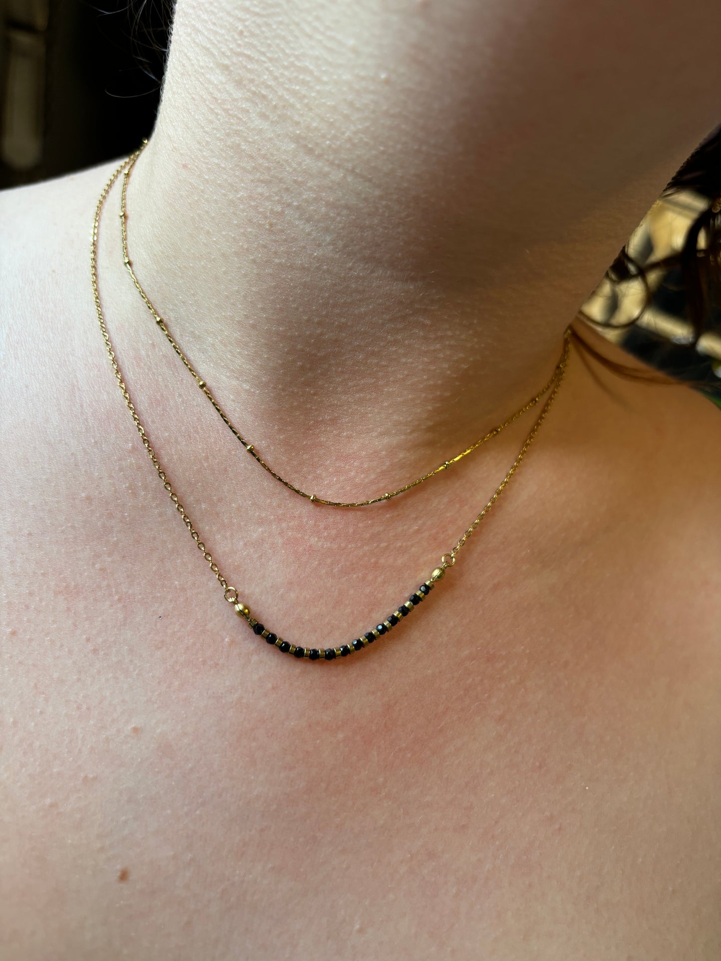 Collier double doré et noir